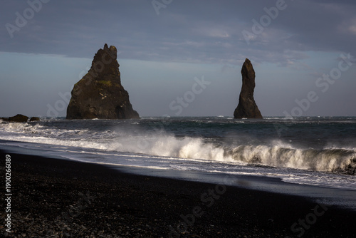 Reynisdrangar sea stacks Langsamur and Landdrangur on Reynisfjara Black Sand Beach, Iceland