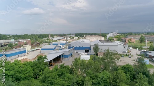 Factory aerial video. large hangar. plant.factory field.a large industrial building in Ukraine. technology and business development. Industry in Ukraine. large hangar in the field.
