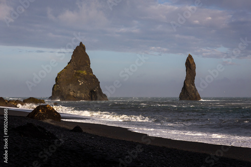 Reynisdrangar sea stacks Langsamur and Landdrangur on Reynisfjara Black Sand Beach, Iceland