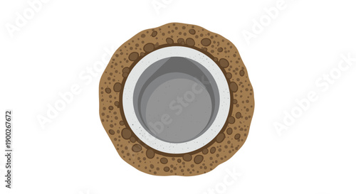 Circular concrete pipe opening embedded in a dark brown textured ground, viewed from directly above.