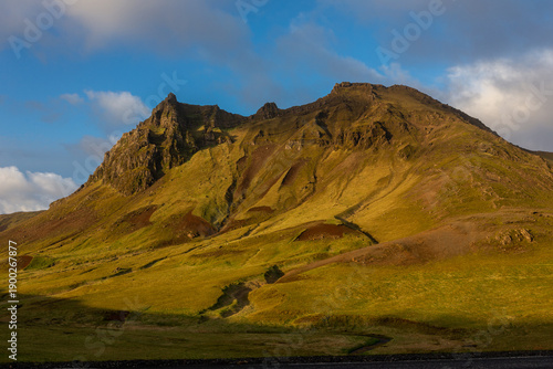 Sunset light on a rugged volcanic mountain ridge along the Ring Road near Vik i Myrdal, Iceland