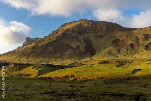 Volcanic mountain ridge with landslide scars at sunset near Vik i Myrdal, Iceland