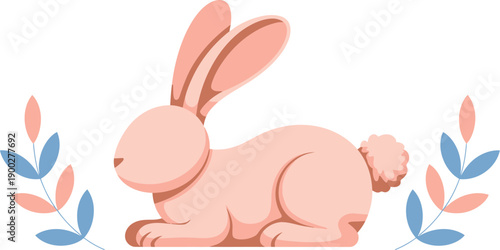 A cute pink bunny sitting in a field with colorful leaves