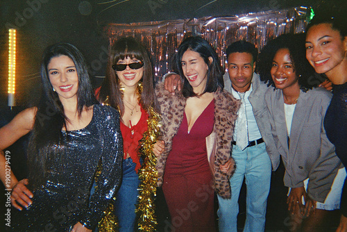 Slika na platnu Diverse friends enjoying fun party with retro analog camera vibe