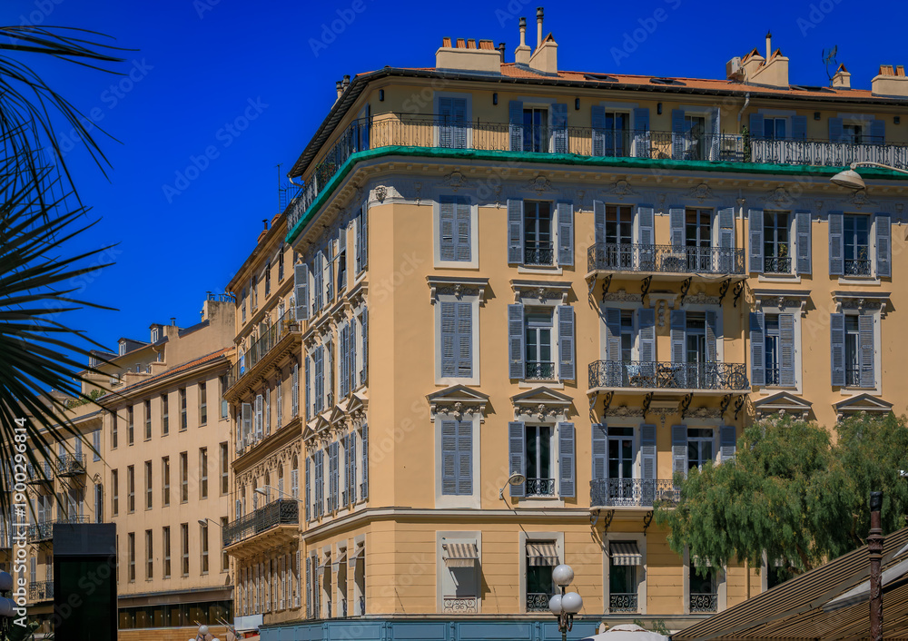 Fototapeta premium Traditional houses with ornate metal work and shutters in the streets of Old Town Vielle Ville in Nice, South of France