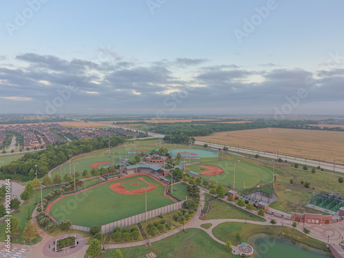 Tableau sur toile Aerial View of Harold Bacchus Community Park with Sunrise, Frisco, Texas (August