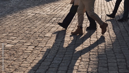 Tourists walking on Red Square cobblestone pavement in Moscow