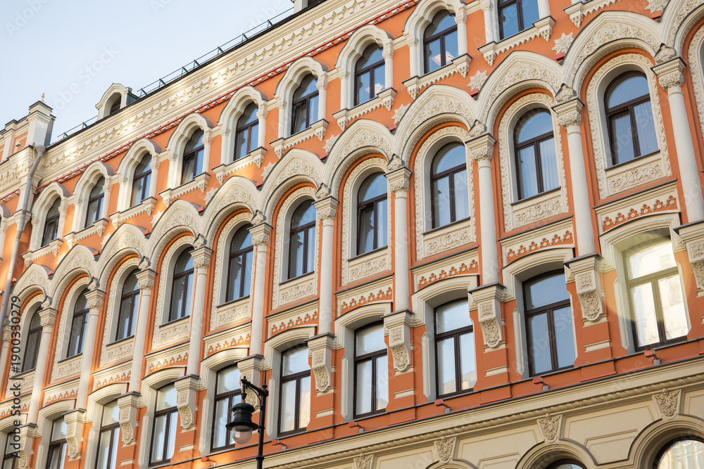 Obraz premium Moscow building facade with ornate architectural details and arched windows