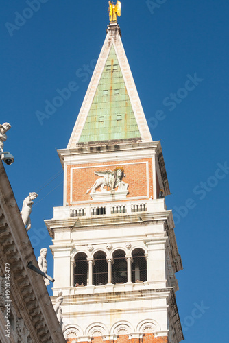 Detail of San Marco tower on San Marco square in Venice