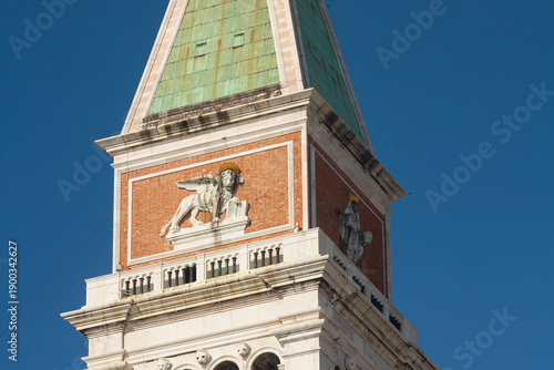 Detail of San Marco tower on San Marco square in Venice