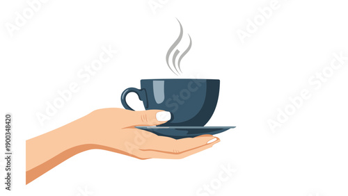Human hand holding a dark blue ceramic cup and saucer with steam rising from a hot beverage against a white background.