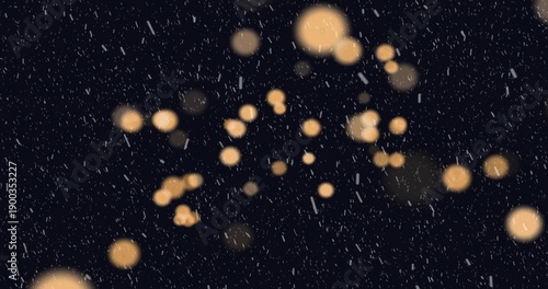 Glowing warm golden orbs creating abstract bokeh at night, showing falling snow streaks