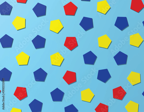 Colorful Pentagons Scattered on a Blue Background.
