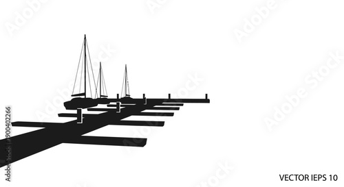 Sailboats on a dock line up.