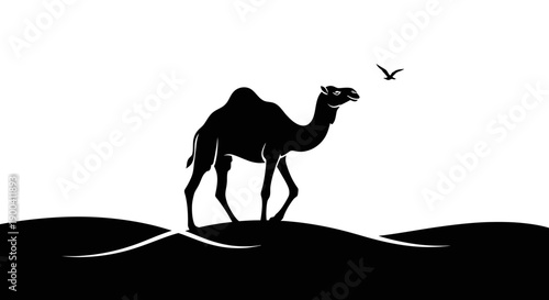 Silhouette of a camel walking alone.