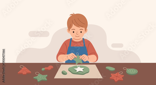 Creative Boy Decorating Christmas Decorations Crafted From Clay In Studio