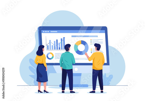 Business team analyzing data on a large computer screen with graphs