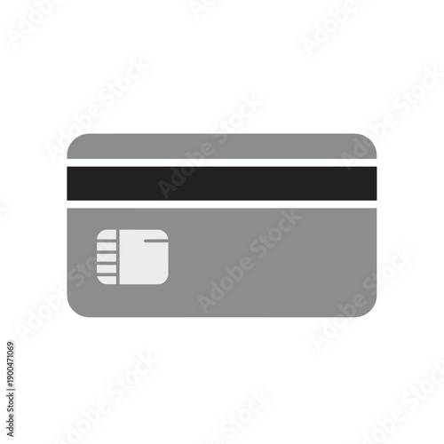 A close-up view of the back of a modern credit card with a chip.