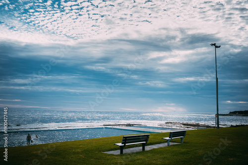 People enjoy beach walks, ocean boating, and coastal leisure on Australia Day at Bellambi Beach, NSW, Australia, January 26, 2024