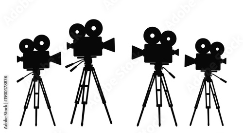 Four vintage film cameras on tripods a striking black silhouette
