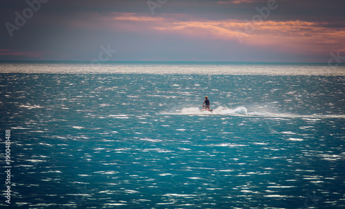 People enjoy beach walks, ocean boating, and coastal leisure on Australia Day at Bellambi Beach, NSW, Australia, January 26, 2024