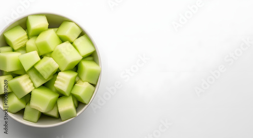 Freshly Cut Honeydew Melon Cubes in a Bowl - A Vibrant and Healthy Snack Option