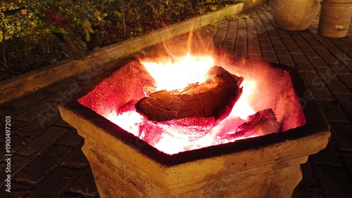 Burning Wood Inside The Stone Bowl