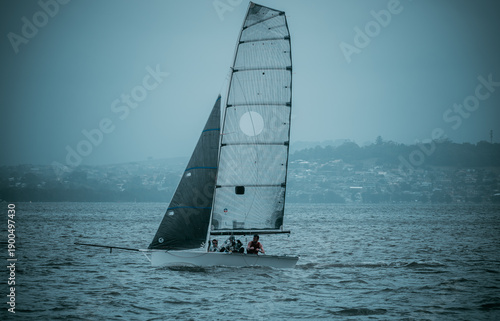 People enjoy beach walks, ocean boating, and coastal leisure on Australia Day at Bellambi Beach, NSW, Australia, January 26, 2024