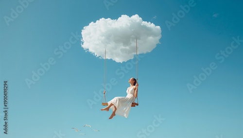 Woman smiling on a swing with a cloud in the sky