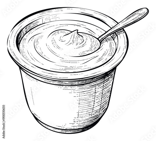 Fresh wholesome yogurt or creamy dessert in a convenient individual serving cup with a spoon for a nutritious breakfast or healthy snack idea