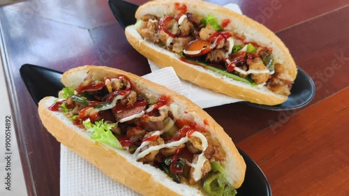 Delicious Quick Lunch features crusty baguettes filled with savory meat and fresh garden vegetables. Authentic local ingredients provide excellent Quick Lunch option for travelers visiting Vietnam.