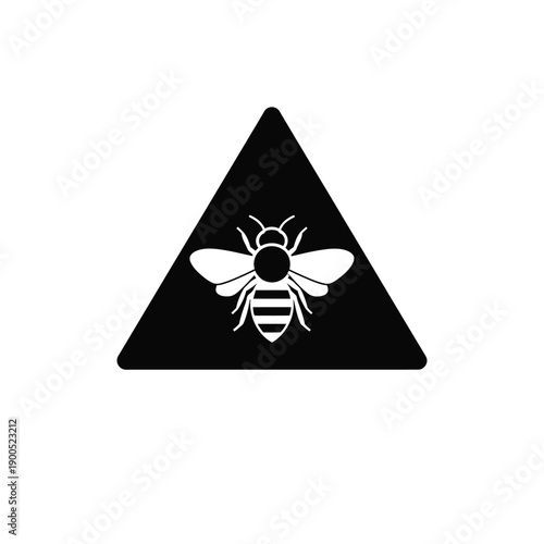 Black warning sign with white bee symbol within triangle. Concept of bee danger, insect alert, and potential sting hazard icon.