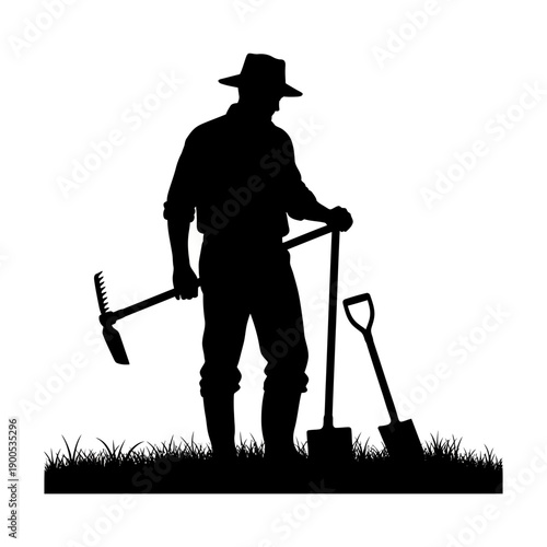 Silhouette of a farmer with gardening tools in a grassy field