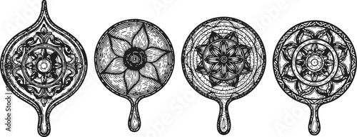 set of four vintage hand mirrors with intricate floral and geometric engraved designs