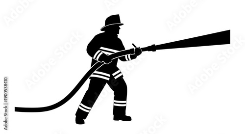 Silhouette of firefighter spraying water with hose