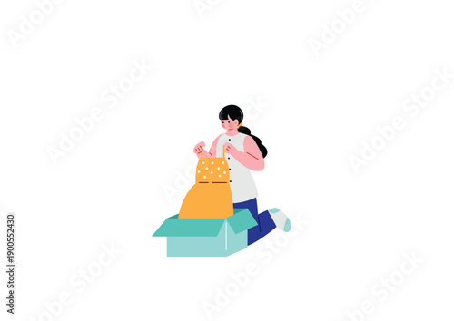 届いた商品の箱を開封する女性