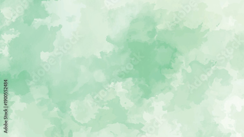 Soft pastel green watercolor background with abstract cloudy texture