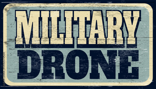 Aged and worn military drone sign on wood