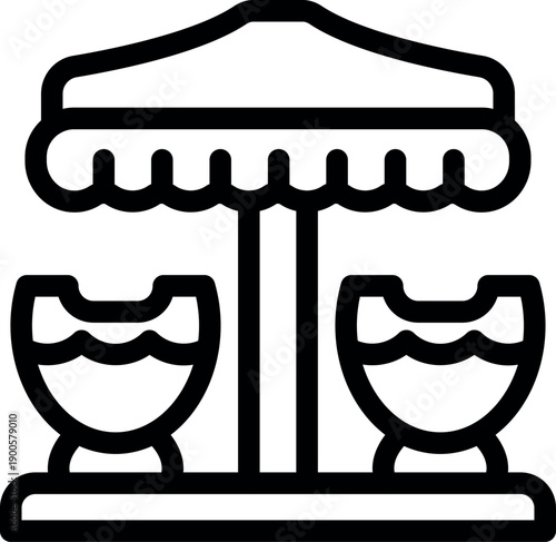 Carousel ride featuring two gondolas and an umbrella canopy, offering a fun amusement park experience