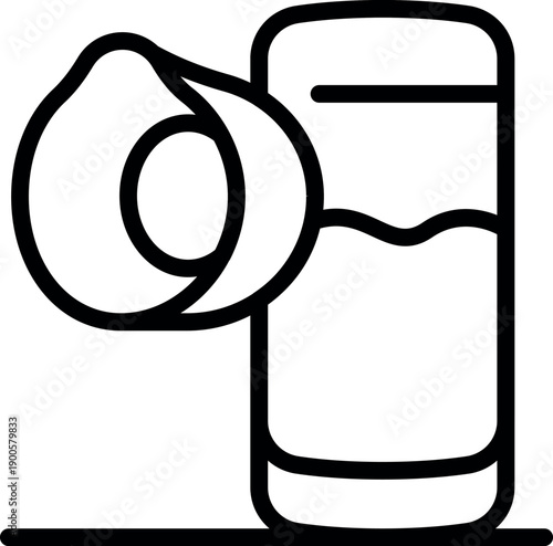 Peach juice in a glass with a peach slice, representing a refreshing summer beverage