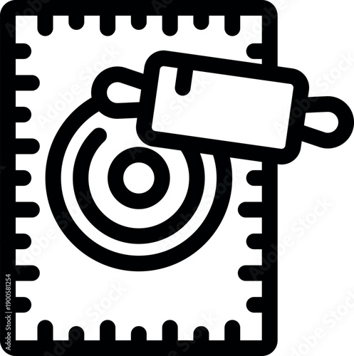 Rolling pin flattening dough on a pastry mat with measurement marks, perfect for baking and cooking