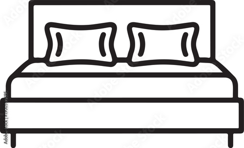 A comfortable bed with two pillows and a cozy blanket.