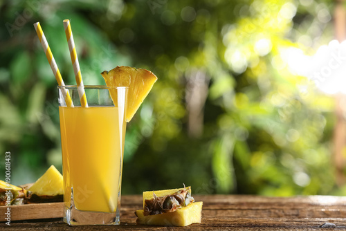 Glass of fresh pineapple ju...