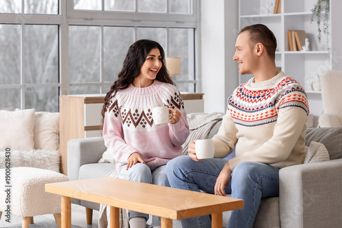 Young couple in warm sweate...