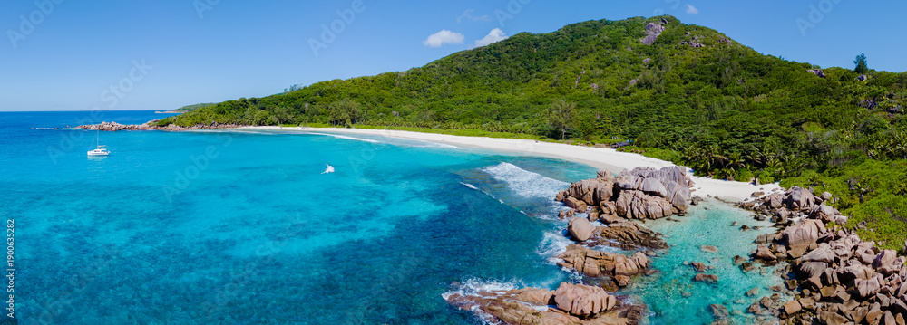 Obraz premium Discover the serene beauty of Anse Cocos beach in La Digue, Seychelles, a tropical paradise