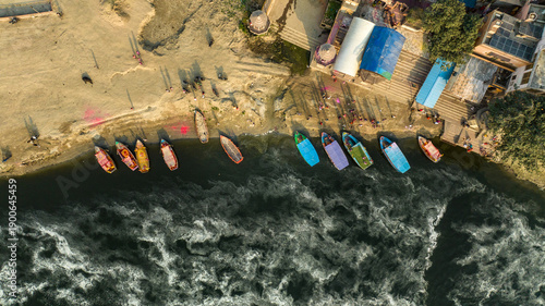 Aerial drone view of the Yamuna River flowing through Mathura, showcasing calm waters, riverbanks, and the sacred landscape of one of India’s most important spiritual cities.