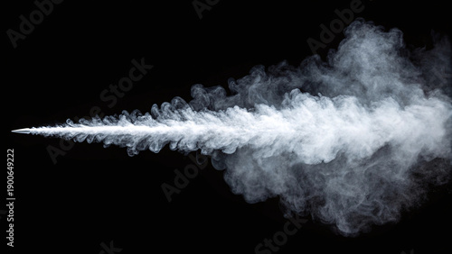High speed bullet creating smoke trail effect isolated on black background in studio shot