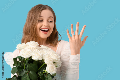 Happy young woman with enga...