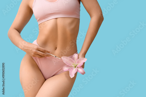 Young woman in underwear wi...