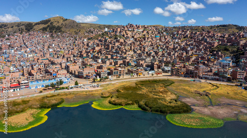 Boats and ferries at Puno port on Lake Titicaca, the highest navigable lake, Peru